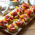 tartelettes renversées aux courgettes et tomates cerises,tartelettes renversées aux courgettes,recette tartelettes renversées,recette tartelettes renversée guy demarle,tartelettes courgettes tomates cerises,tartelettes au pesto et jambon,moule 12 tartelettes renversées Ohra Guy Demarle,recette de tartelettes renversées aux courgettes,tartelettes renversées aux courgettes et pesto,recette de tarte salée avec de la ricotta,tartelettes moelleuses courgettes mozzarella